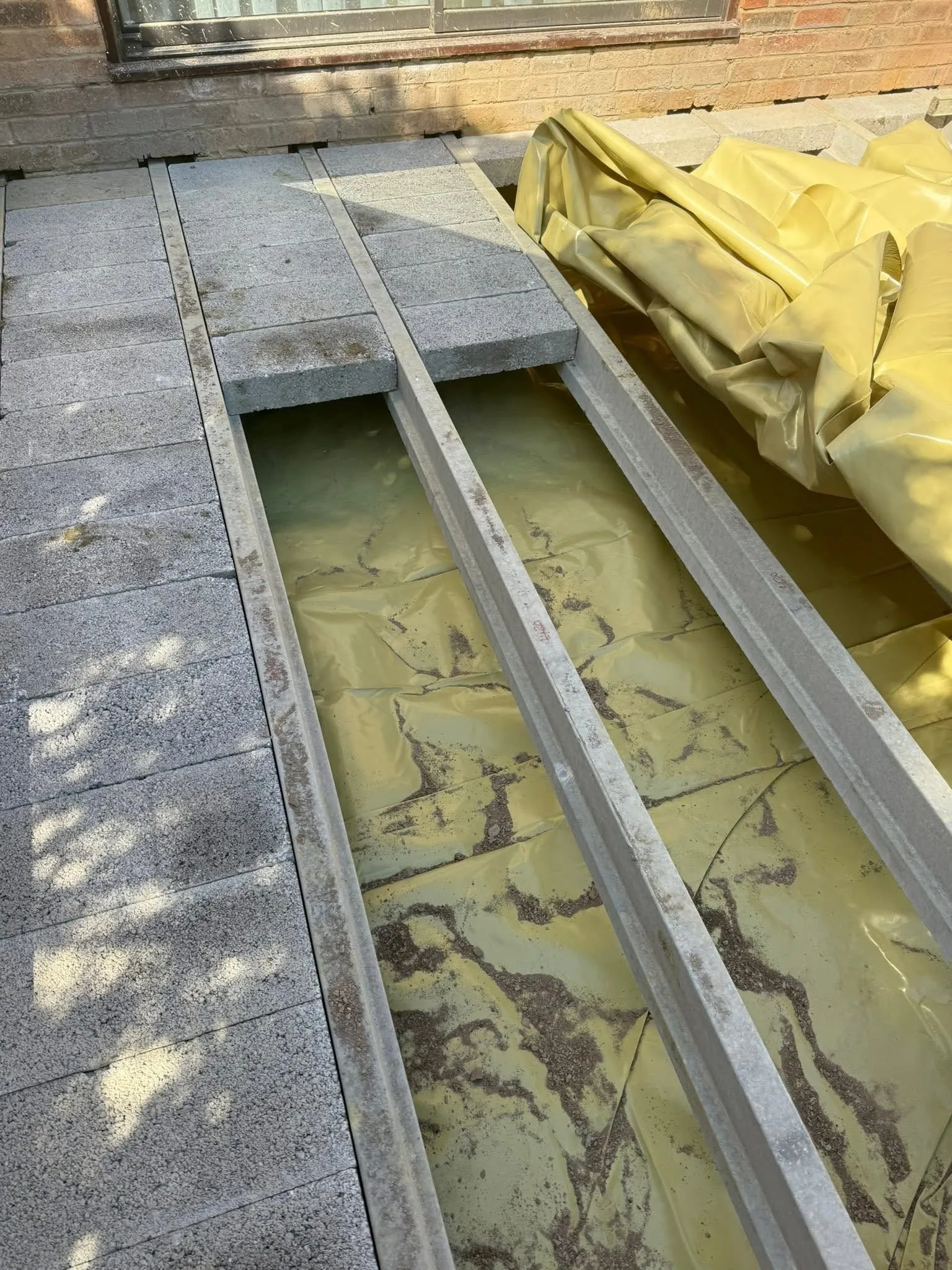 Beam and block floor being laid on new foundations